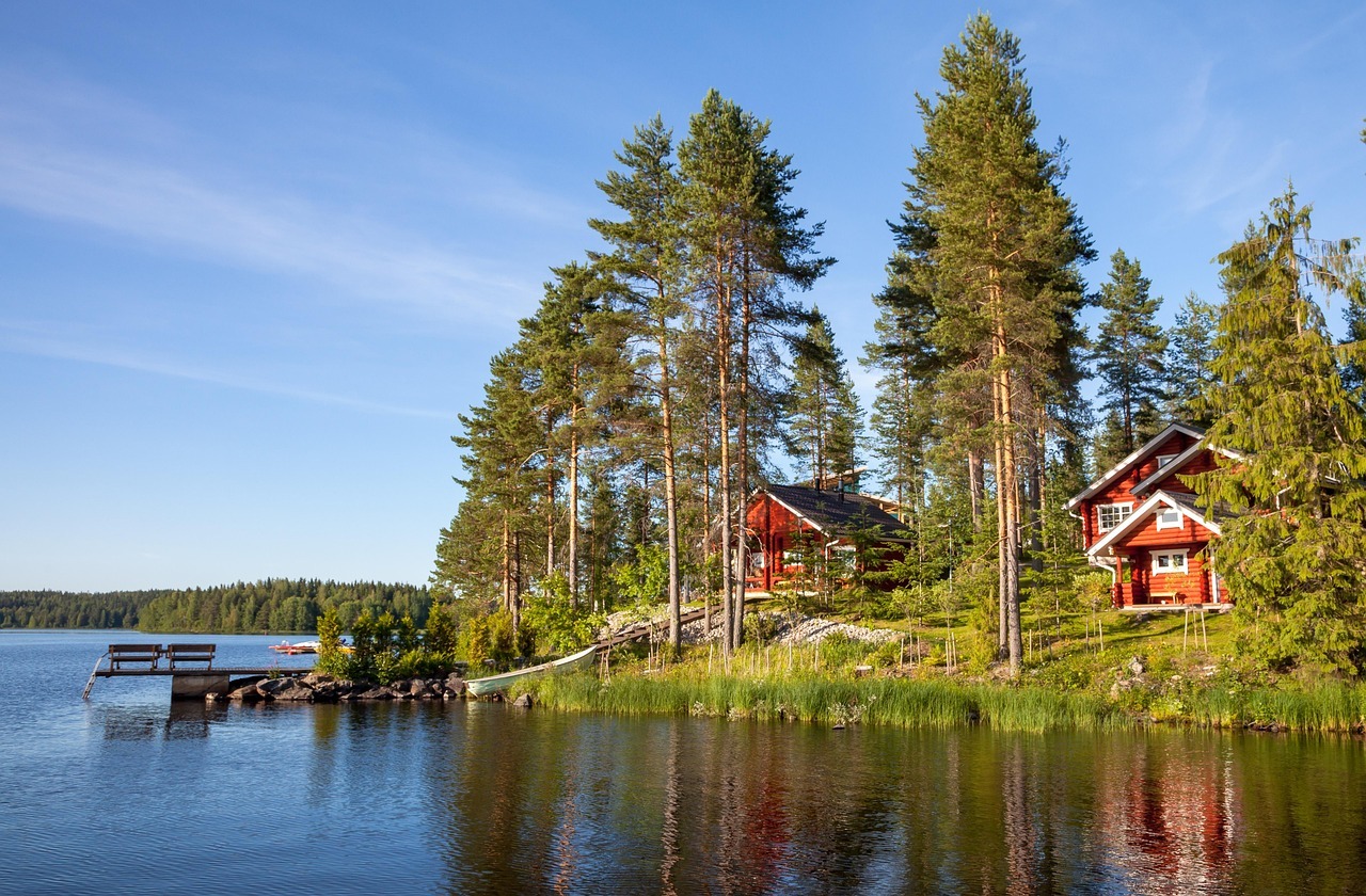 Red cabins on lake Muskoka protected by cottage insurance coverage