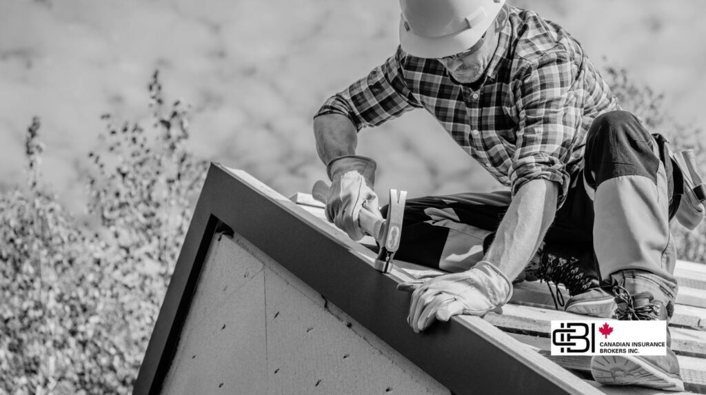 Roofer wearing safety gear installing shingles on a residential roof in Oakville, demonstrating skilled work protected by roofing contractor insurance.