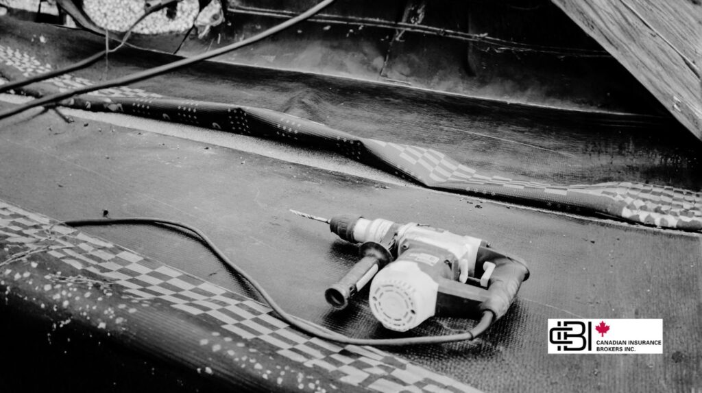 Close up of roofing tools and a power drill on a roof surface during a repair project in Oakville, representing the equipment used by insured roofing contractors.