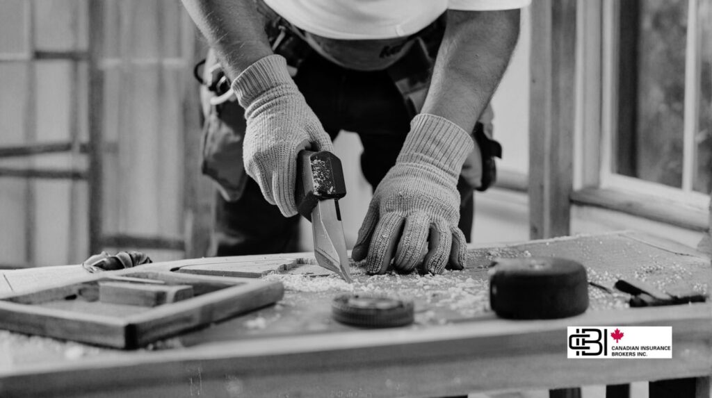 Close-up of a contractor cutting wood during a home renovation job, illustrating the need for contractor insurance coverage in Oakville.