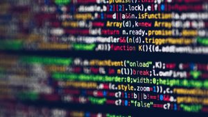 Close-up of software code representing IT and technology services exposed to professional liability and errors and omissions risks in Oakville