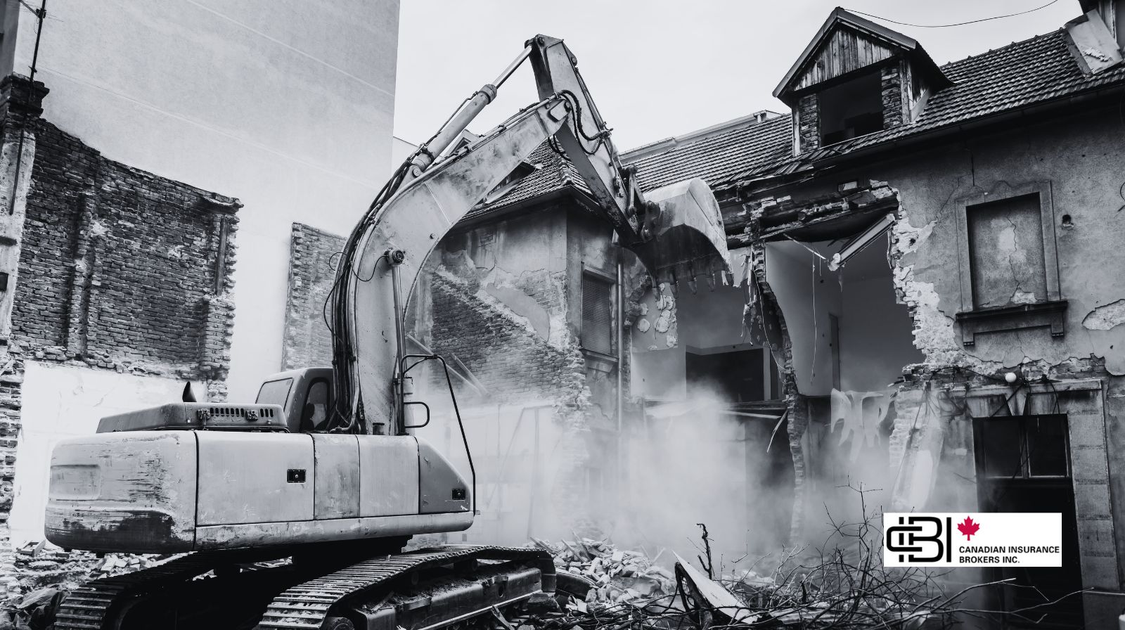 Alt text: Excavator performing structural demolition on a building in Ontario, illustrating demolition contractor insurance risk