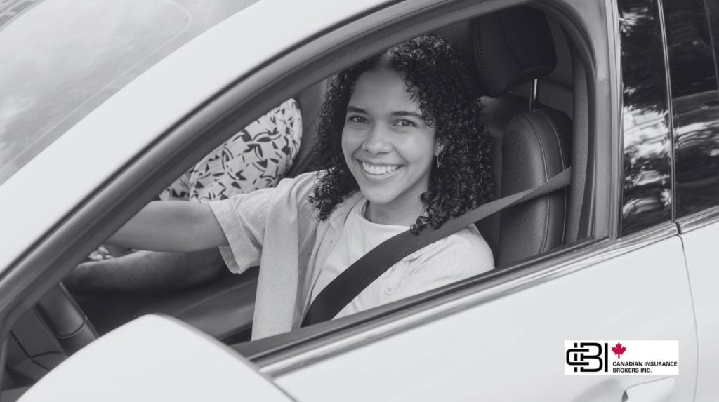 Ontario driver seated in a rental vehicle reviewing coverage