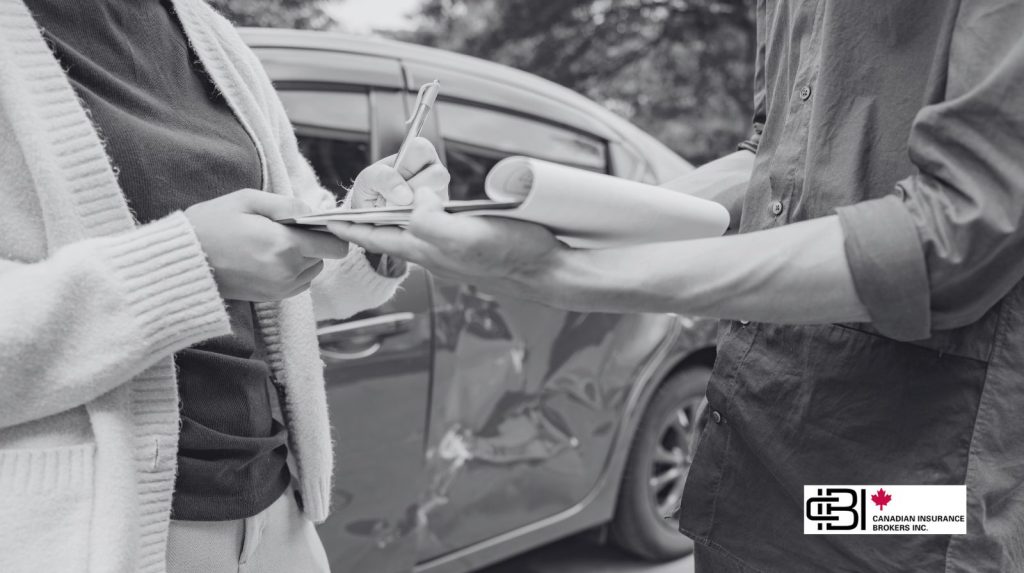 Drivers documenting vehicle damage after a car accident related to accident benefits Ontario claims