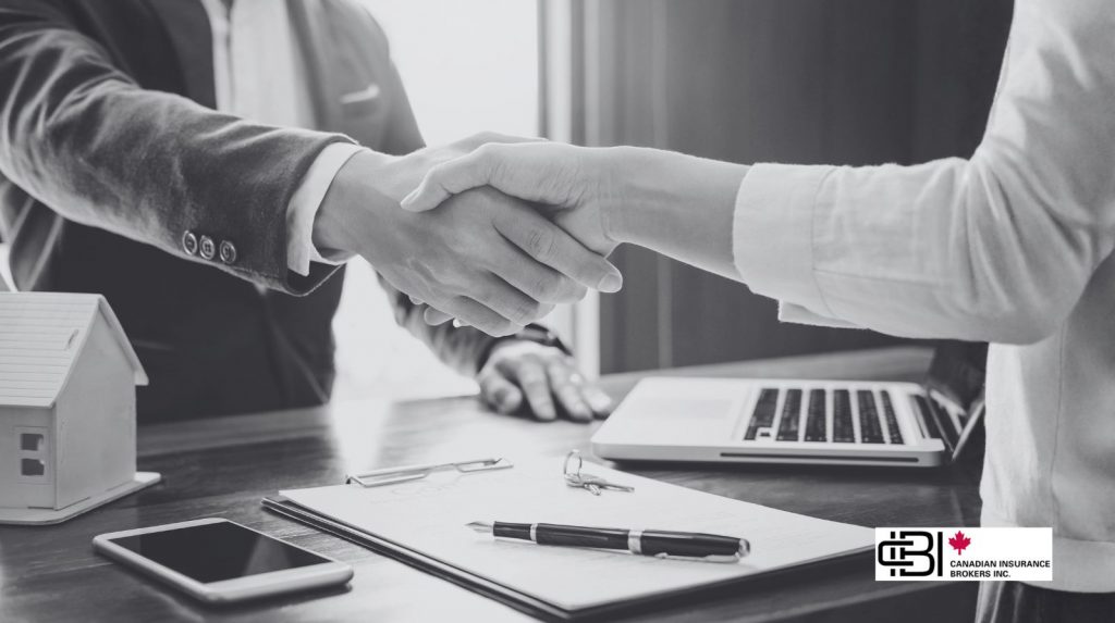 Client and advisor discussing umbrella insurance policy agreement