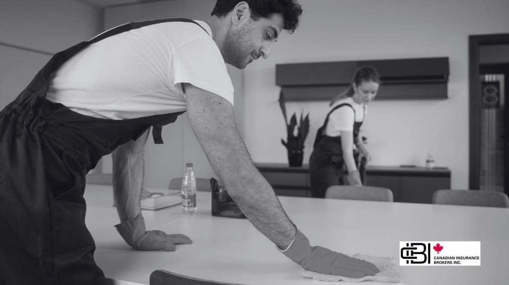 Professional cleaners disinfecting a conference table, highlighting the importance of cleaning business insurance for liability protection