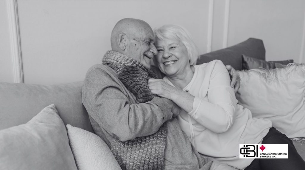 Senior couple discussing estate planning and joint-life insurance benefits at home