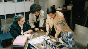Creative team reviewing brand colours and design concepts during a collaborative marketing project.