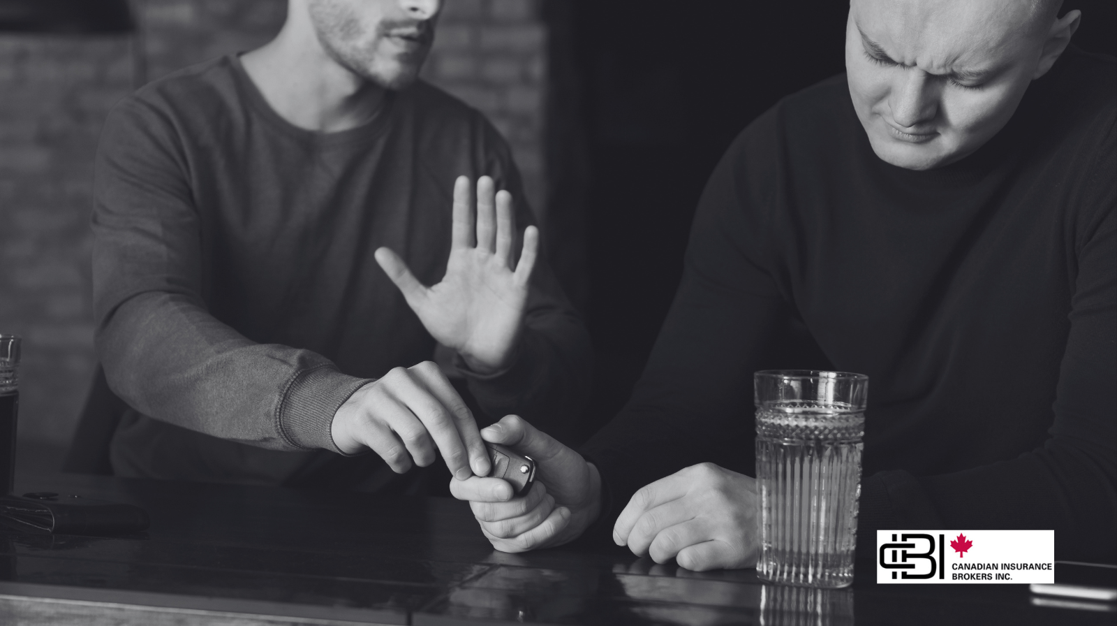 Person stopping a friend from driving after drinking at a bar, illustrating prevention of impaired driving Ontario.