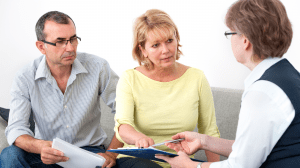 HR professionals discussing employment documents and workplace matters with clients in Oakville