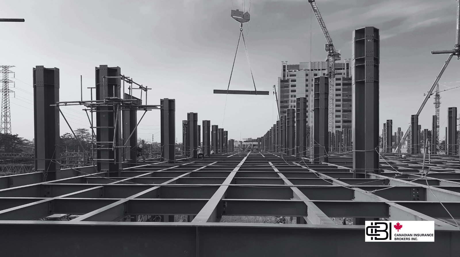 Steel framework of a commercial build illustrating course of construction insurance coverage during active structural development
